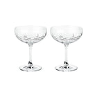 To facetslebne champagneskåle i klart krystalglas med diamantmønster til servering fra Frederik Bagger