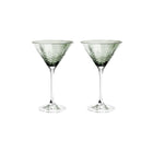 To facetslebne cocktailglas i grøn krystal med diamantmønster til borddækning fra Frederik Bagger