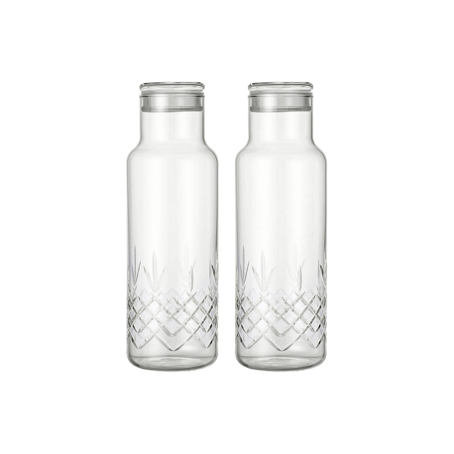 To klart glasflasker med facetslebet diamantmønster til servering fra Frederik Bagger - Denmark