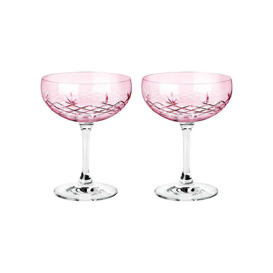 To facetslebne champagneskåle i rosa krystalglas med diamantmønster og klart stilk fra Frederik Bagger